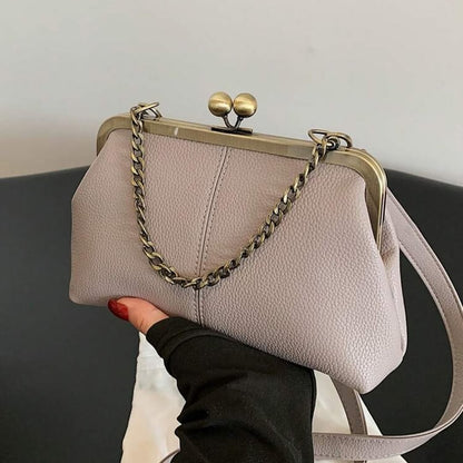 Hand, shoulder & crossbody bag
